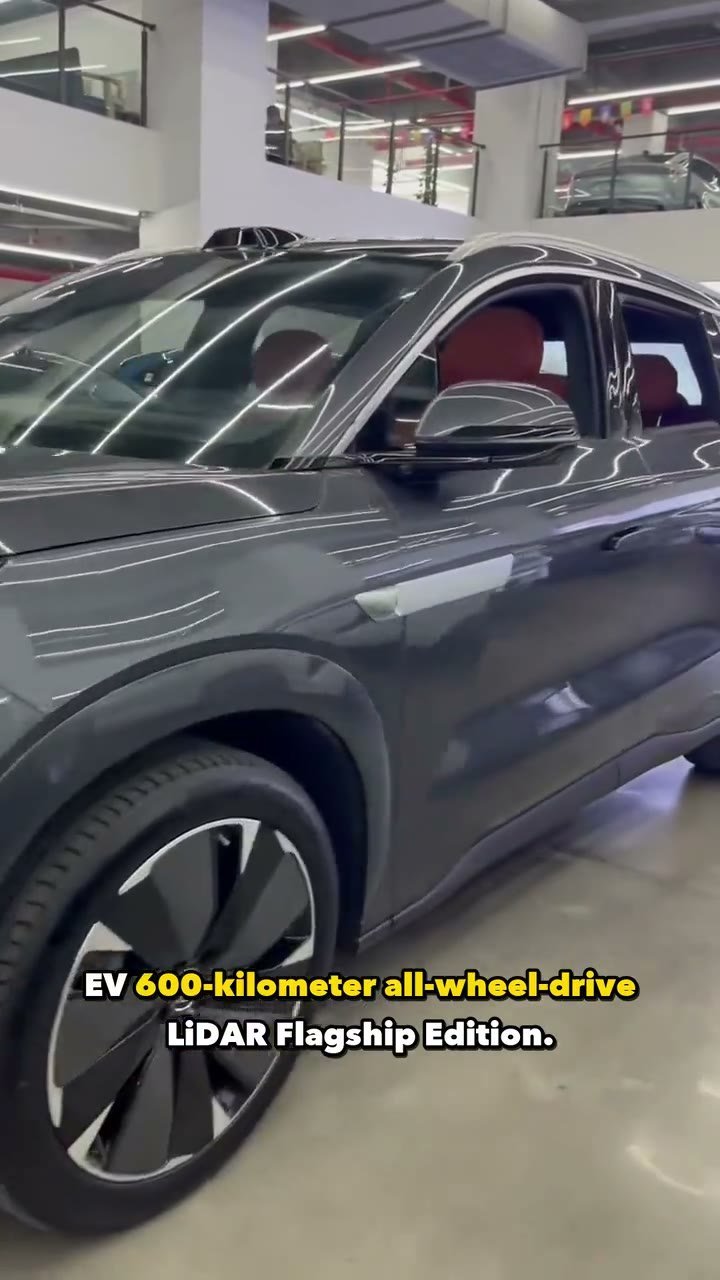 Used BYD Tang L undergoing a vehicle walkaround and paint check